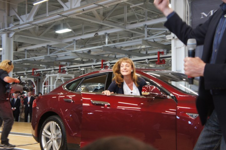 Investor Nancy Pfund getting into her Model S at the Tesla factory on the day of the launch of the Model S.